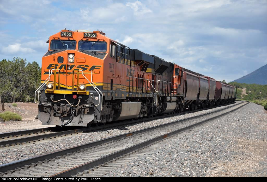 Grain train rolls east